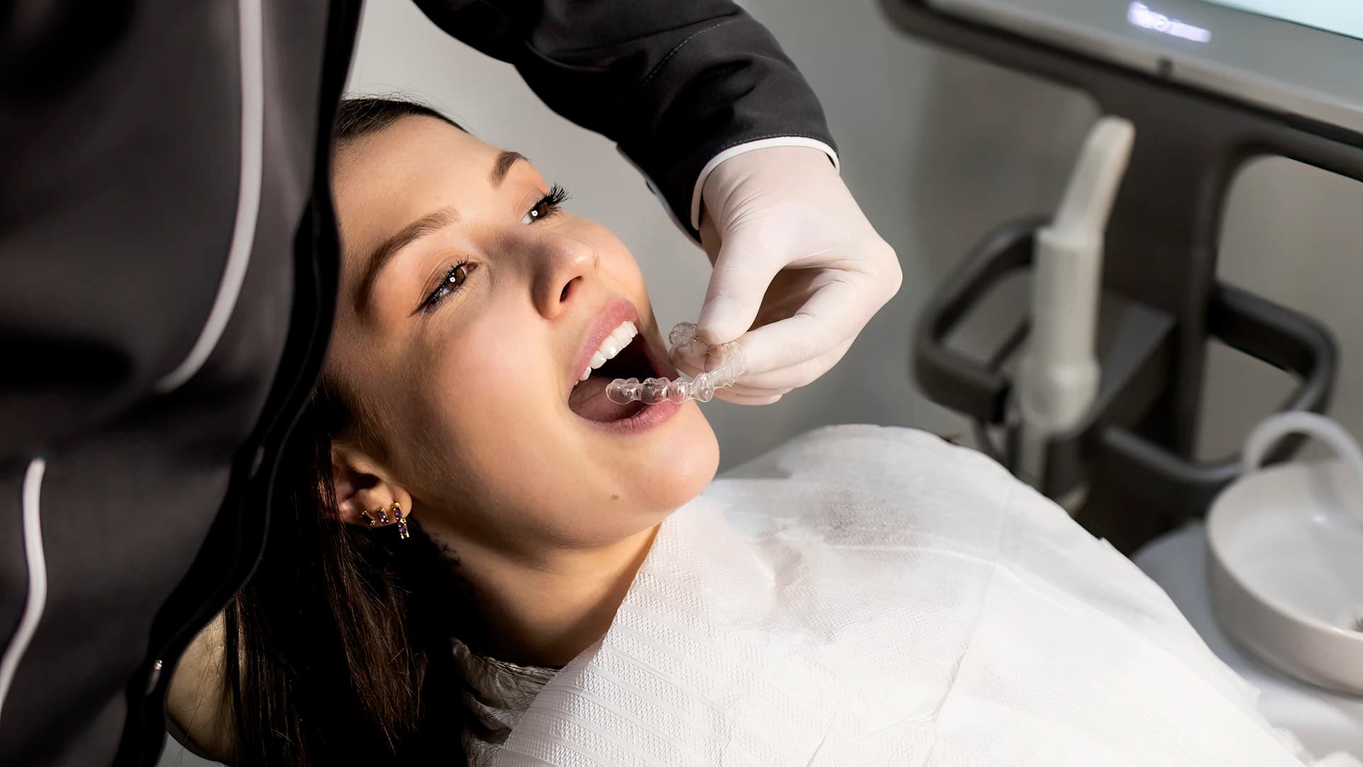 A patient fitted for a clear dental aligner in a Seoul clinic