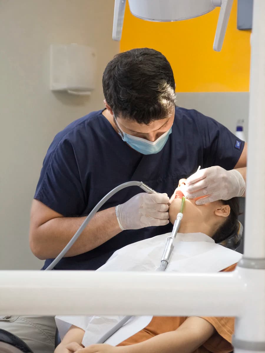 A dentist carrying out a routine examination